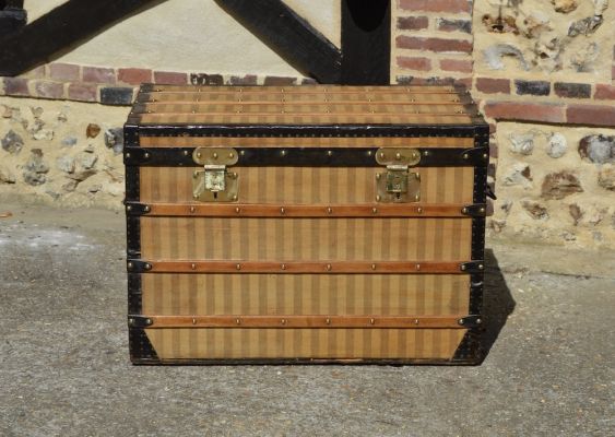 This magnificent striped steamer trunk from the Louis Vuitton