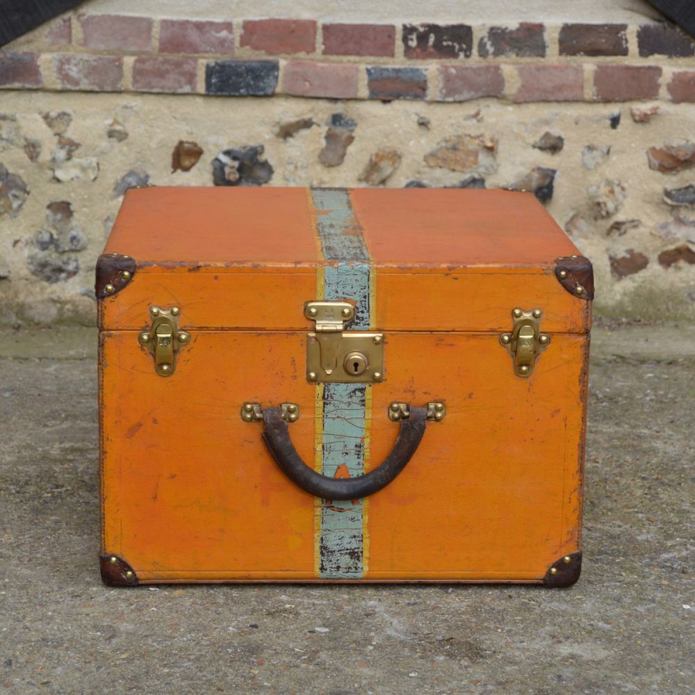 Louis Vuitton orange hat trunk