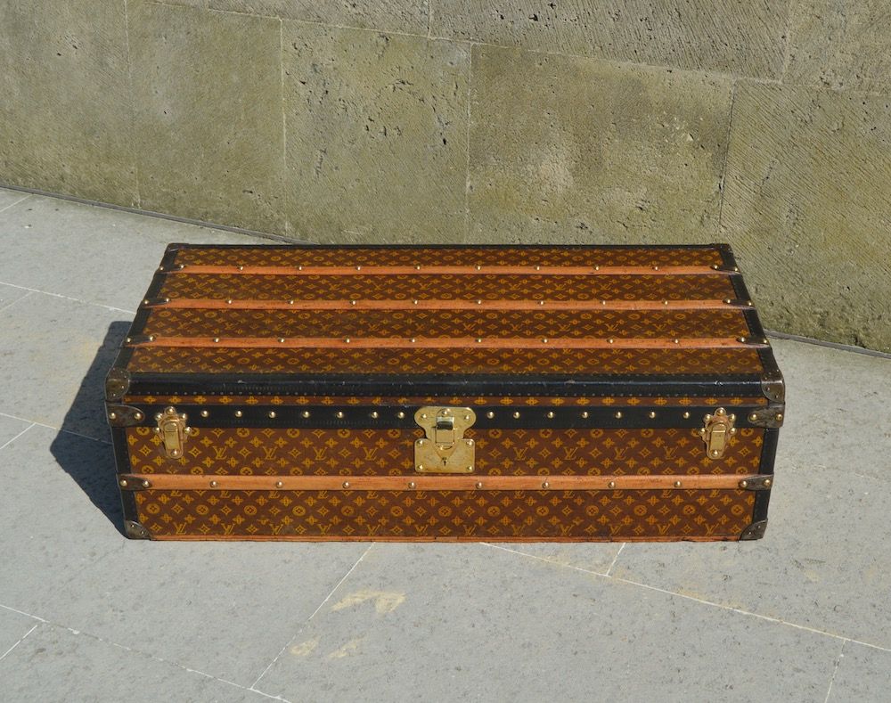 This Louis Vuitton cabin trunk with stenciled monogrammed canvas is ideal  for a coffee table