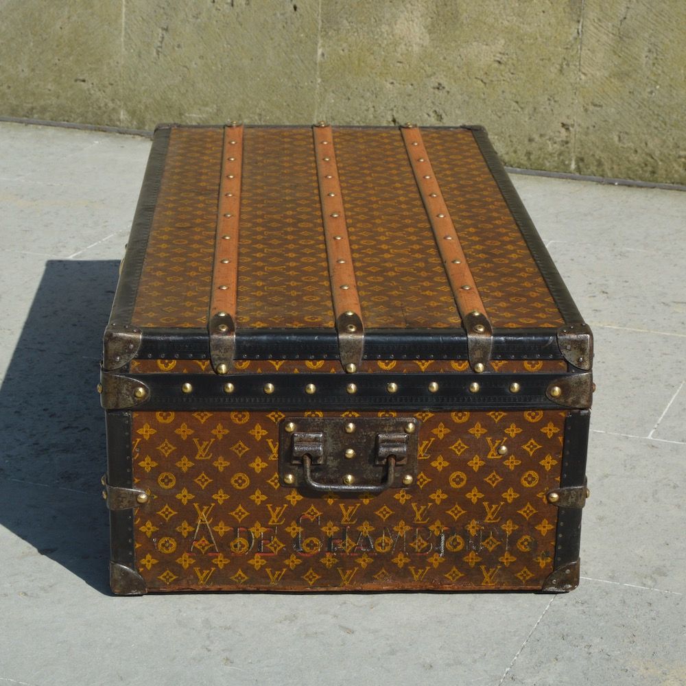 This Louis Vuitton cabin trunk with stenciled monogrammed canvas is ideal  for a coffee table