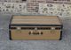 Beige Moynat cabin trunk